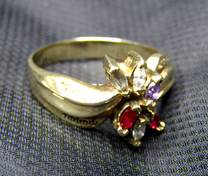lot 649 image: 10k Gold (marked 10K) cocktail ring with Rubies, Diamonds, Amethyst