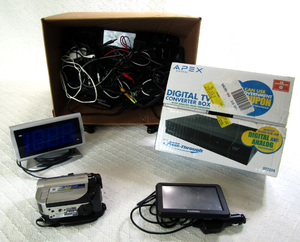 lot 564 image: Retro electronics including Garmin GPS, Apex Digital TV converter, Sony hand camera and assorted cords