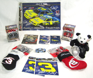 lot 603 image: NASCAR Dale Earnhardt collectibles, Christmas stockings, race car ornaments, Ultra decals and more as shown