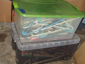 lot 538 image: Two totes full of clothing hangers