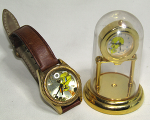 lot 645 image: Warner Bros Tweety bird oil infused watch and Tweety bird mini clock