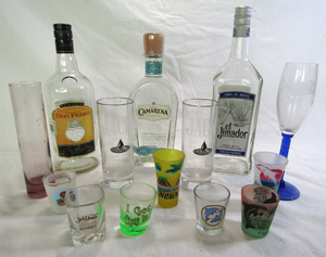lot 700 image: Assorted shot glasses, Jack Daniels whiskey glasses, collectible Tequila bottles