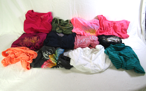 lot 710 image: Assorted ladies shirts and blouses as shown