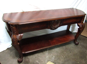 lot 676 image: Broyhill foyer accent table, Cherry wood veneers and solids throughout. 60 wide x 20 deep x 30 tall