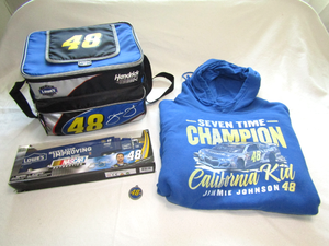 lot 596 image: NASCAR Jimmy Johnson number 48, 18 can cooler, die cast truck and medalion. Like new condition