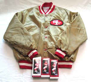 lot 625 image: San Francisco Forty Niners sports jacket and Keepsake Joe Montana Christmas ornaments