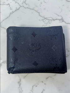 lot 39 image: MCM Visetos Monogram Canvas Slim Card Holder Wallet  Black  Well Loved