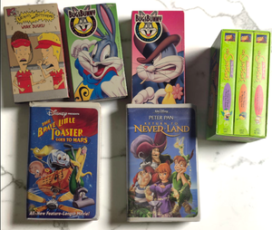 lot 54 image: Vintage VHS Lot  Simpsons (3), Disney (2), Bugs Bunny (2), Beavis &amp Butthead