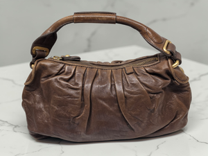 lot 71 image: Juicy Couture Brown Leather Hobo Bag Ruched Shoulder Purse Y2K Vintage Style