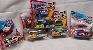 lot 114 image: Disney Pixar Cars Diecast Lot (5)  Chick Hicks, DJ, Sarge, Vern, Tim Rimmer  Look Eyes Change  New