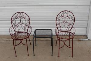 wrought iron outdoor bistro set with peacock-back chairs. And table