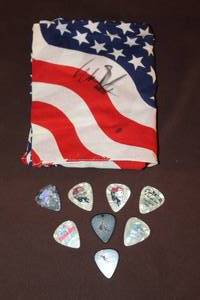 lot 34 image: Willie Nelson picks and bandana signed