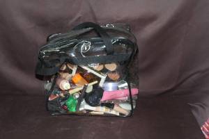 lot 71 image: Bagful of makeup and accessories see pictures for details