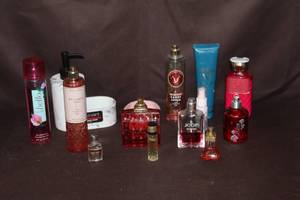 lot 73 image: collection of various Bath & Body Works fine fragrance mists, body lotions, and perfumes