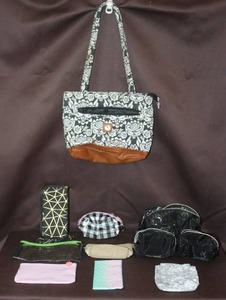 lot 85 image: collection of assorted tote bags, pouches, and cosmetic bags.