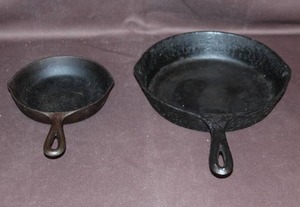 lot 105 image: 2 cast iron pans