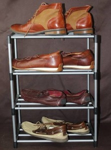 lot 117 image: Shoe rack with assortment of shoes size 13 mens