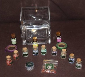 lot 130 image: Bottles of crystals and more see pictures for details