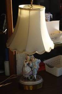 lot 165 image: Victorian-style porcelain figurine table lamp featuring a courting couple,