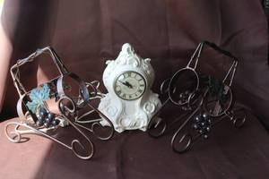 lot 217 image: 2-wine bottle holders and a mantel clock,