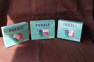 lot 218 image: 3-NIB Puzzles