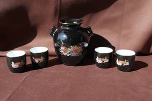 lot 233 image: vintage Japanese black ceramic vase, with 4-vintage Japanese porcelain teacups