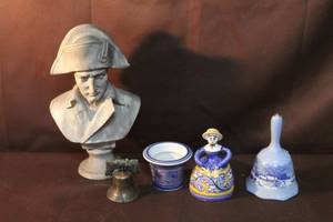 lot 298 image: collectible sculpture featuring a bust of Napoleon Bonaparte hat has a chip on the front see picture and a collection of bells and more see pictures for details