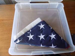 lot 53 image: small folded American flag