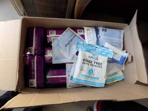 lot 77 image: packs of prevail large daily underwear, rinse free bath sponges