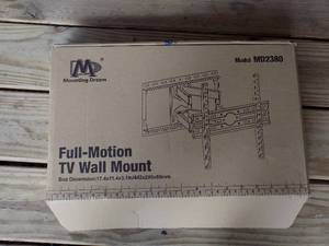lot 27 image: full size TV wall mount in box