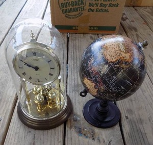 lot 103 image: small world globe, and table top dome clock