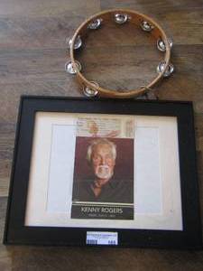 lot 165 image: Kenny Rogers LOT -  framed picture,  ticket and a signed Tambourine