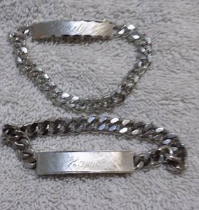 lot 66 image: 2 SILVER BRACELETS CIDNY AND HOWIE