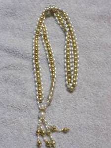 lot 59 image: GOLD & PEARL TASSEL NECKLACE