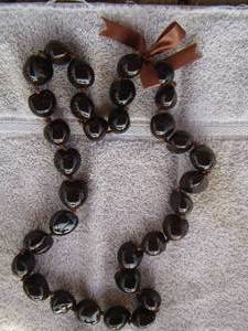 lot 20 image: BROWN KUKUY NUT LAI LC CLOSURE