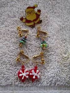 lot 34 image: 2 PAIR Christmas EARRINGS & SANT PIN