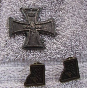 lot 92 image: 1960S SURFERS CROSS   BLACK INITATIONAL PIN  QTY 2
