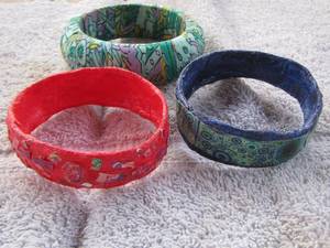lot 130 image: 3 BRACELETS - 1 FABRIC COVERED 2 PAPER MACHE