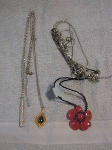 lot 143 image: NECKLACES X 9