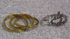 lot 278 image: MINT & LILLIE 3 BAND RING & NAME RING