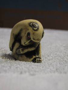 lot 175 image: MONKEY WITH RED EYES - NETSUKI CARVED