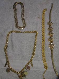 lot 200 image: 4 GOLDTONE NECKLACES