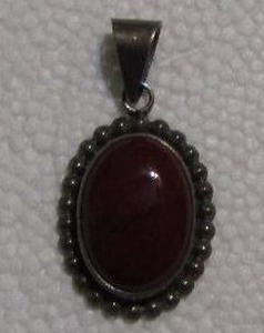 lot 244 image: NECKLACE DROP WITH DEEP RED STONE