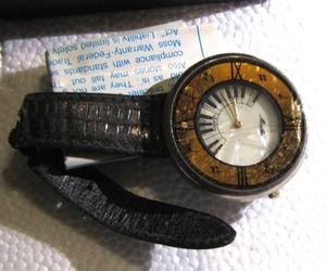lot 202 image: MOULIN QUARTZ WATCH PIANO THEME