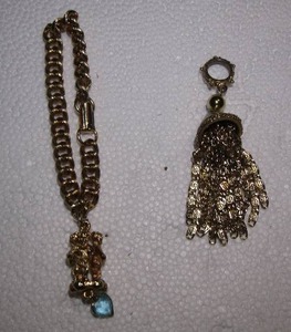 lot 254 image: CHERUB BRACELET & TASSEL DROP