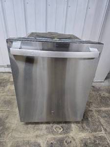 lot 79 image: GE 24 Built-In Stainless Steel Dishwasher.  Front panel has damage