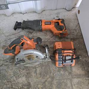 lot 126 image: Lot of 3 Ridgid Tools.  Includes Cordless 18v R864 Reciprocating Saw, Cordless 18v R865 Circular Saw & 18v Battery Charger