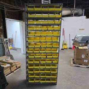 lot 193 image: Metal Shelf w Storage Bins.  Includes 70 Akro Mils 30-130 Yellow Bins