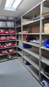 lot 243 image: Lot of 2 Metal Shelves w Contents & Bins.  Buyer must take all.
