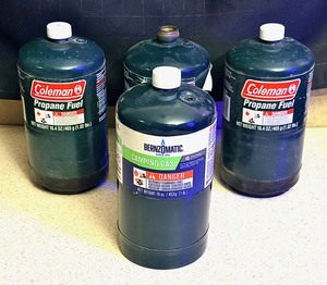 lot 12 image: Four (4) 16oz Bottles of Propane Fuel
